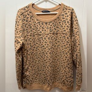 Size L, abercrombie, leopard print, crewneck, with snap detail.
